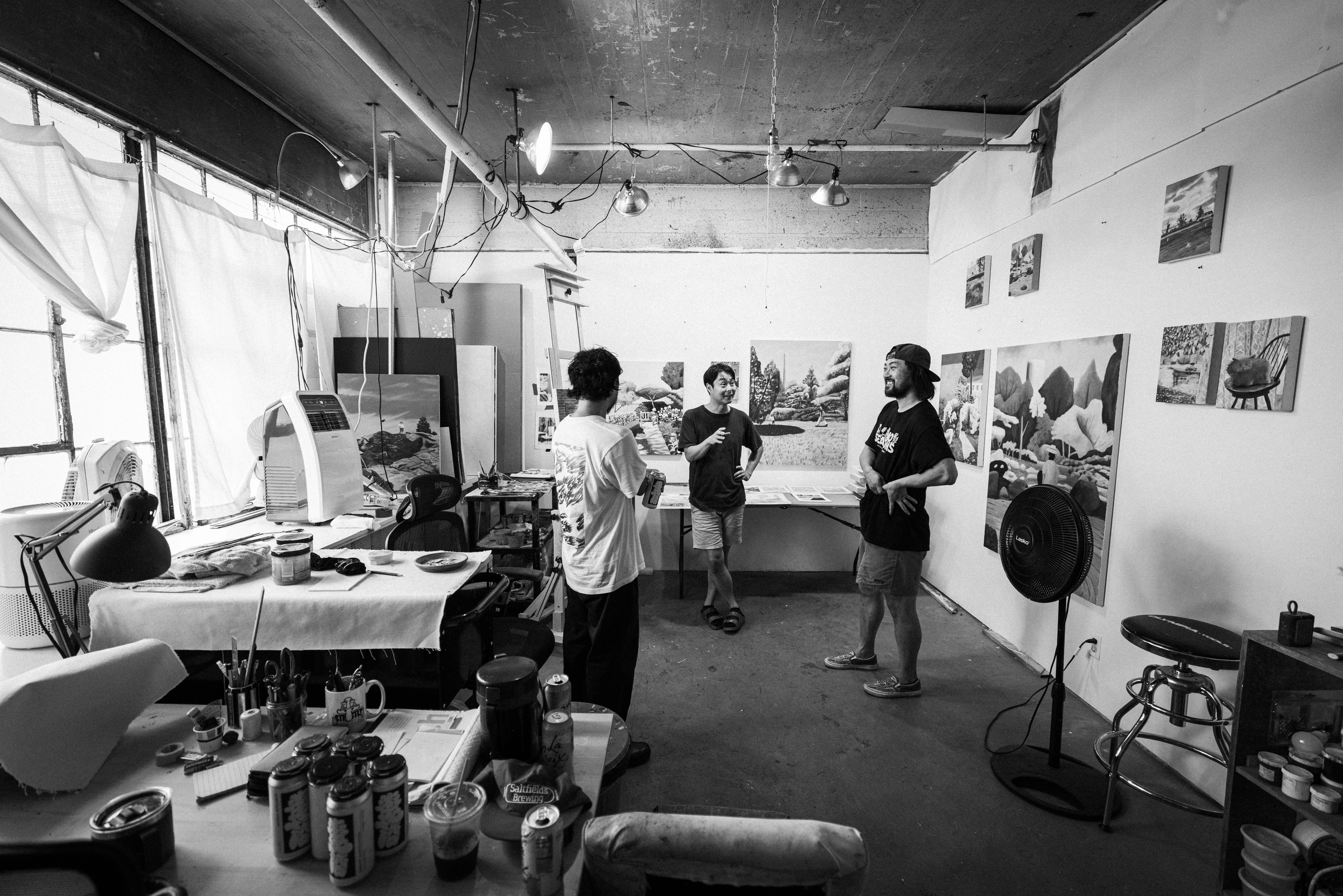A black-and-white view of an artist studio