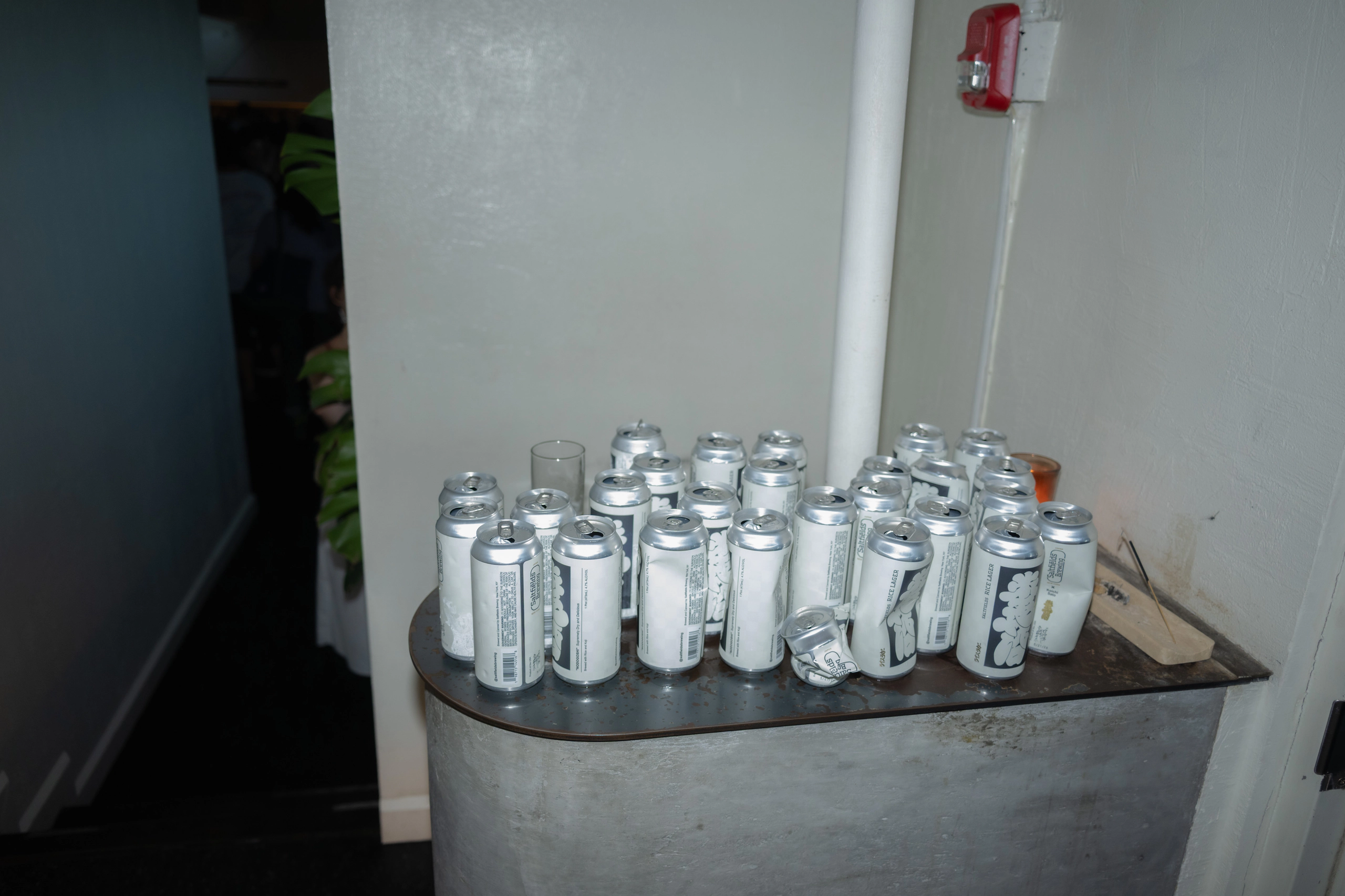 Saltfields cans arranged on a small table