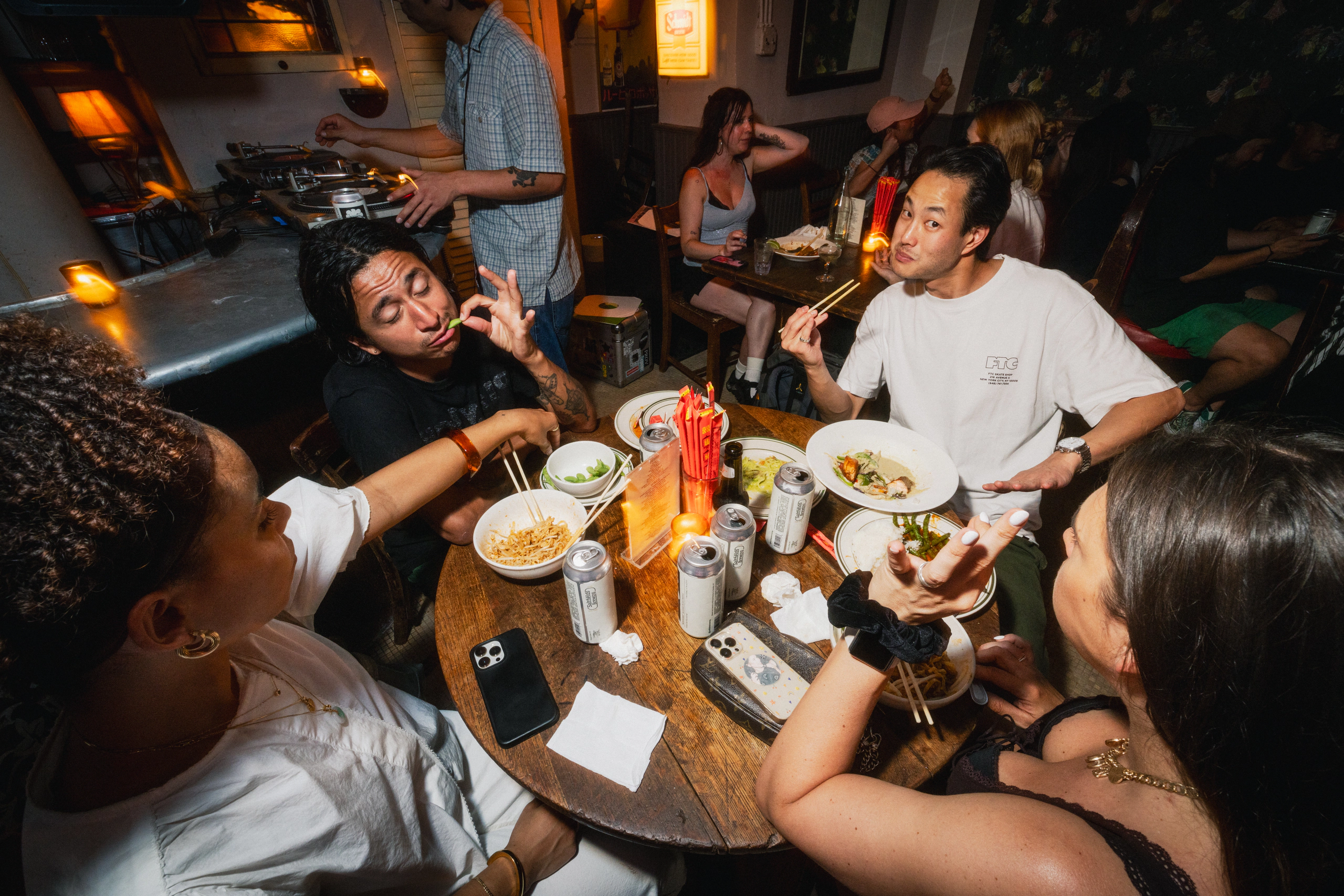 Guests sharing dinner and Saltfields beer at an event